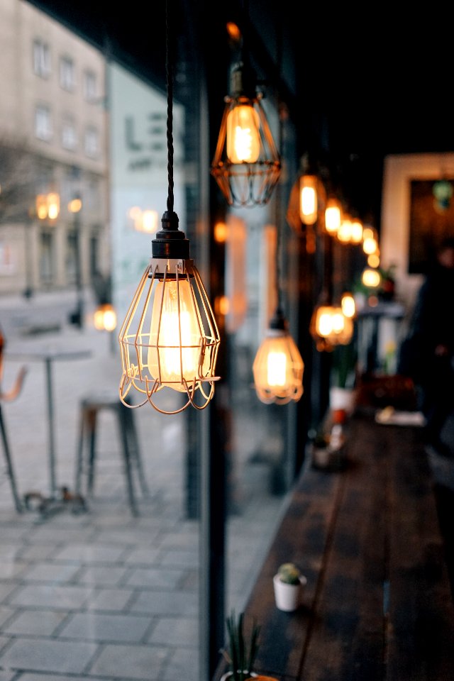 shallow focus photography of store pendant lamps