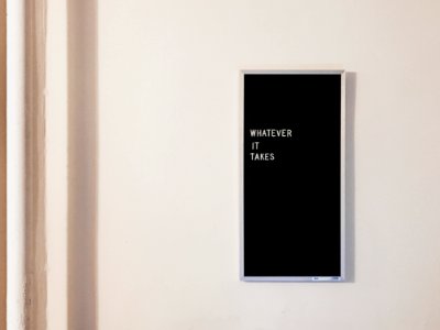 gray metal framed chalkboard with whatever it takes written photo