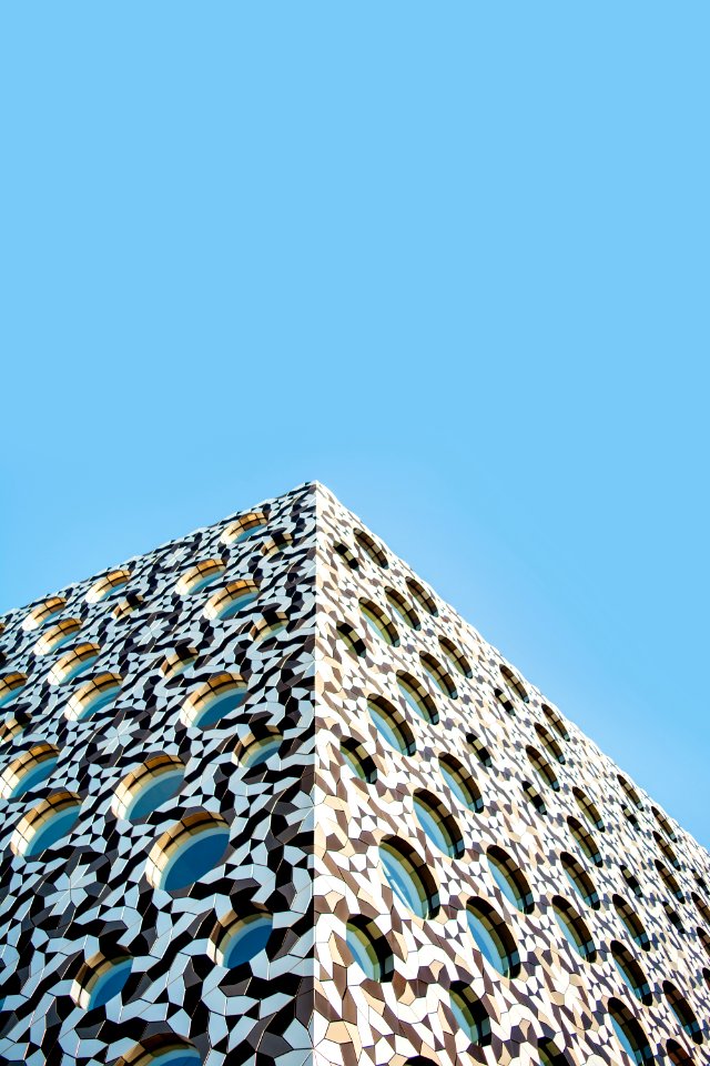 architectural photography of triangular building