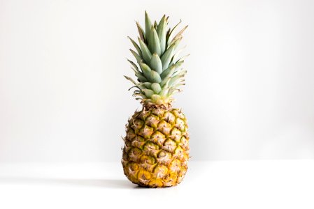 pineapple on white surface photo