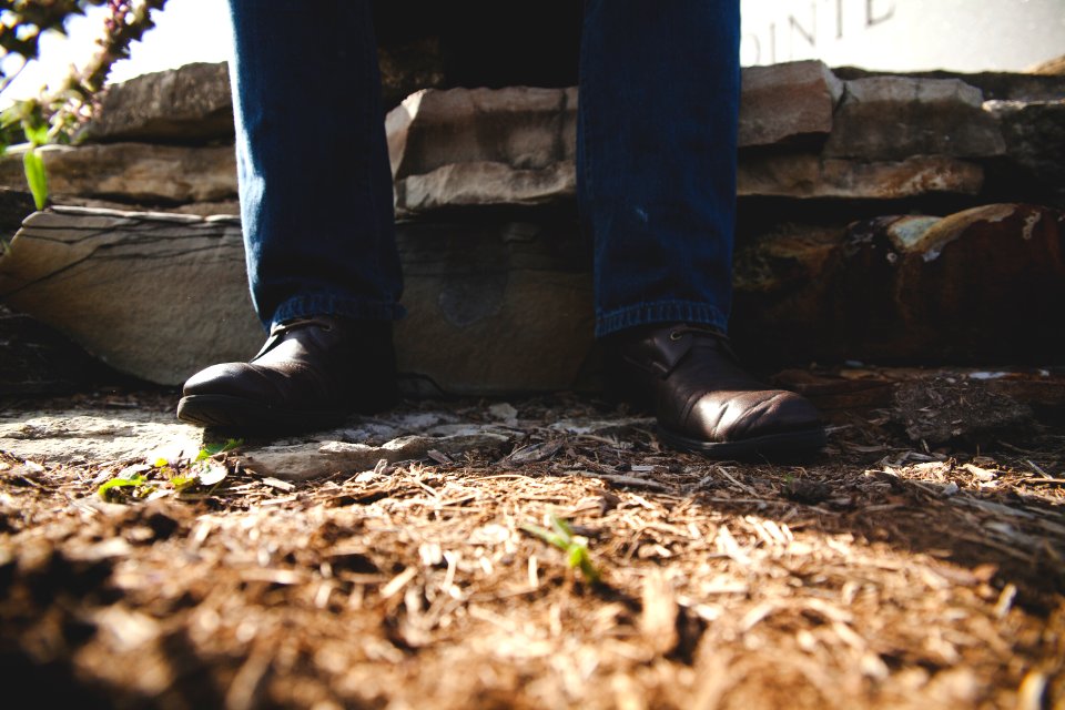 person standing on gray surface