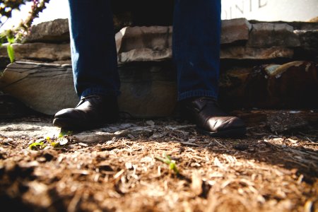 person standing on gray surface