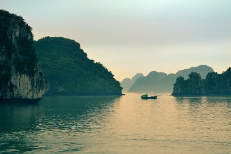 outboard boat on body of water