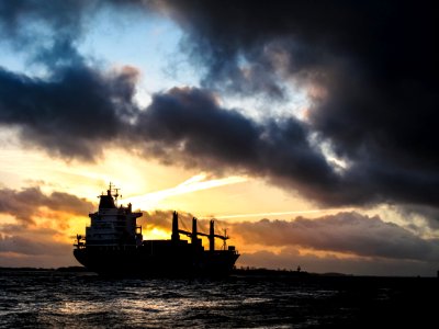 ship sailing during sunset