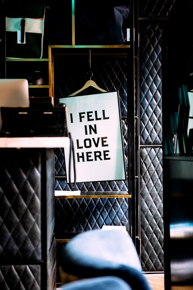 i fell in love here poster in a room