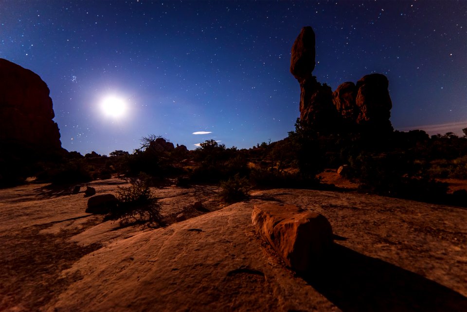 rock formation under starry skies