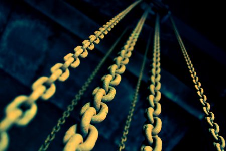 low angle photography of gray metal chains photo
