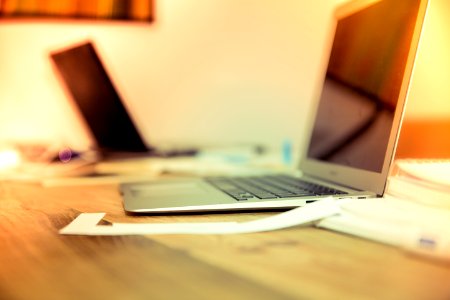 MacBook Air on top of table photo