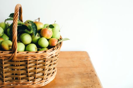 green fruits in basket photo
