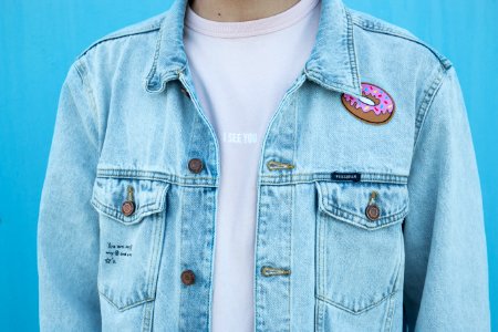 close shot of person denim top