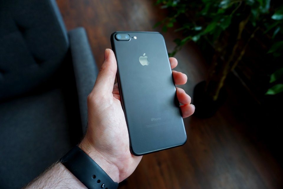 person holding black iPhone 7 Plus