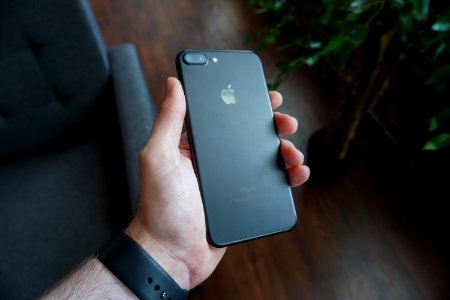 person holding black iPhone 7 Plus