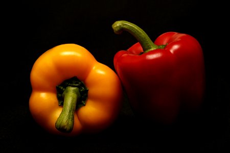 two red and orange bell peppers photo