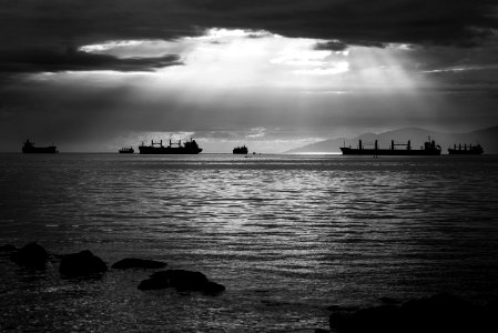 grayscale photo of ships on water photo