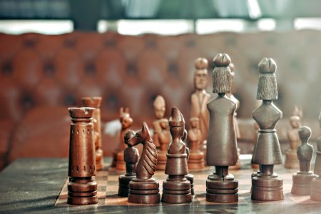selective focus photography of chess pieces photo