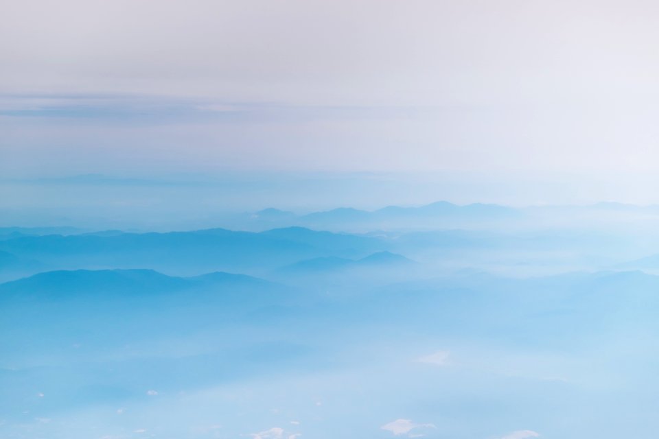mountain covering with clouds