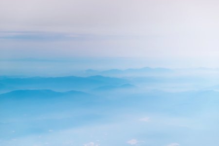 mountain covering with clouds