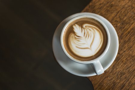 coffee latte serve in ceramic mug photo