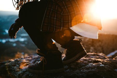 person on top of mountain