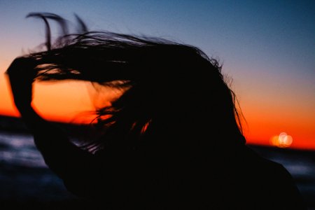 silhouet photo of woman hair photo