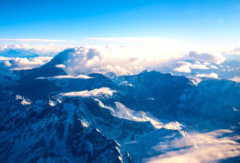 mountain ranges covered in clouds