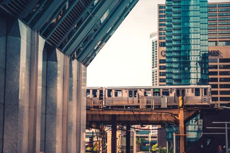 architectural photography of train and buildings photo