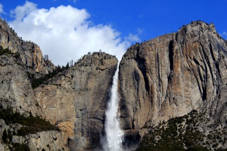 waterfalls between gray stone mountain photo