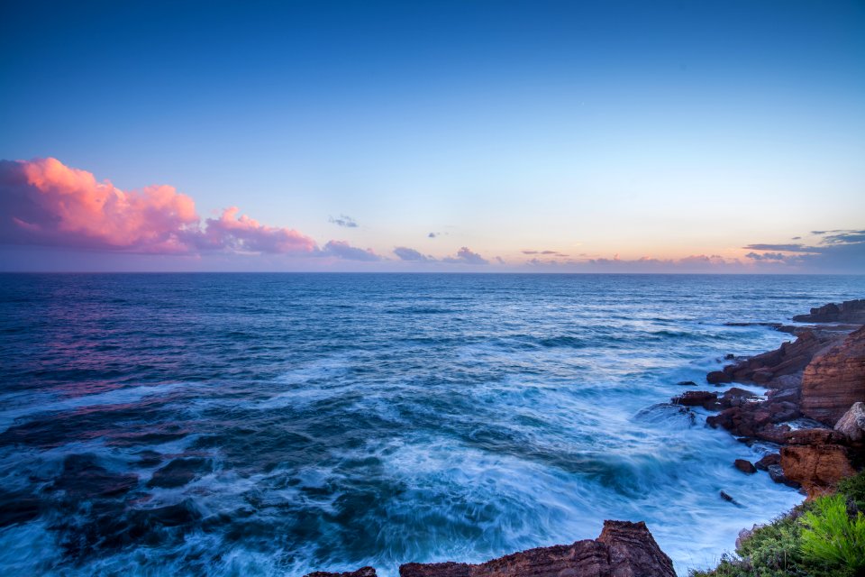 body of water during daytime photo