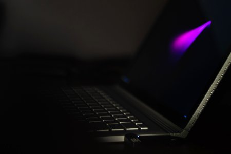 USB flash drive attached to laptop computer