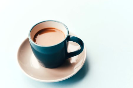 cup of coffee with saucer photo