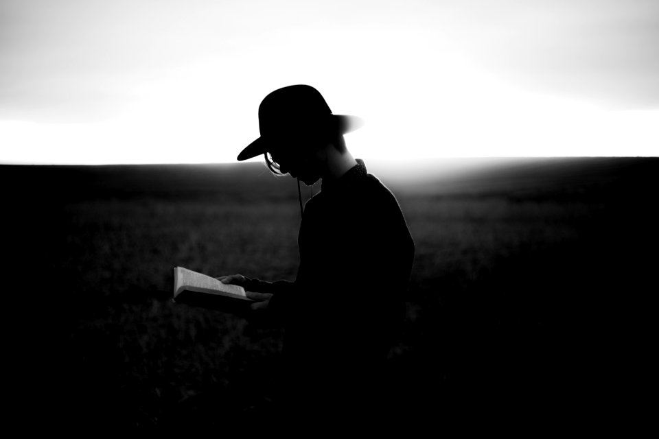 man reading book