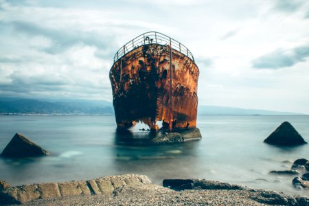 shipwreck near seashor photo