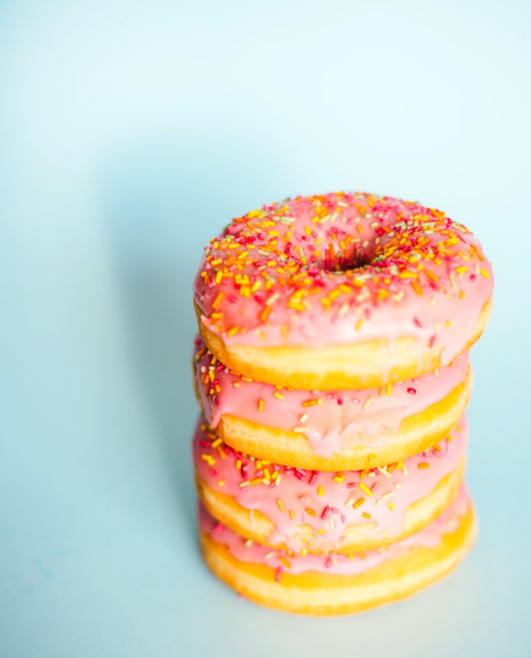 brown and pink doughnut close-up photography