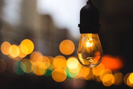 macro photography of yellow light bulb photo