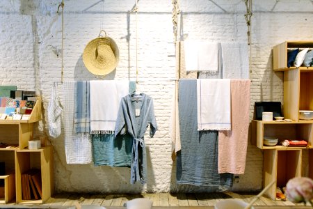 assorted-color towels hanging inside room photo