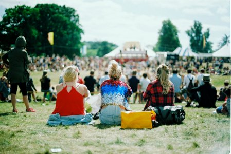 group of people on grass field under sunny day photo