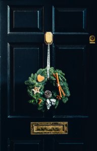 green wreath hang on door photo