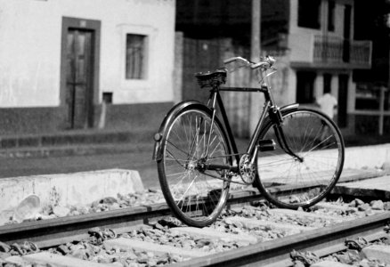 grayscale photo of commuter bike