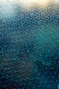 A blue bubble wrap pattern background. photo