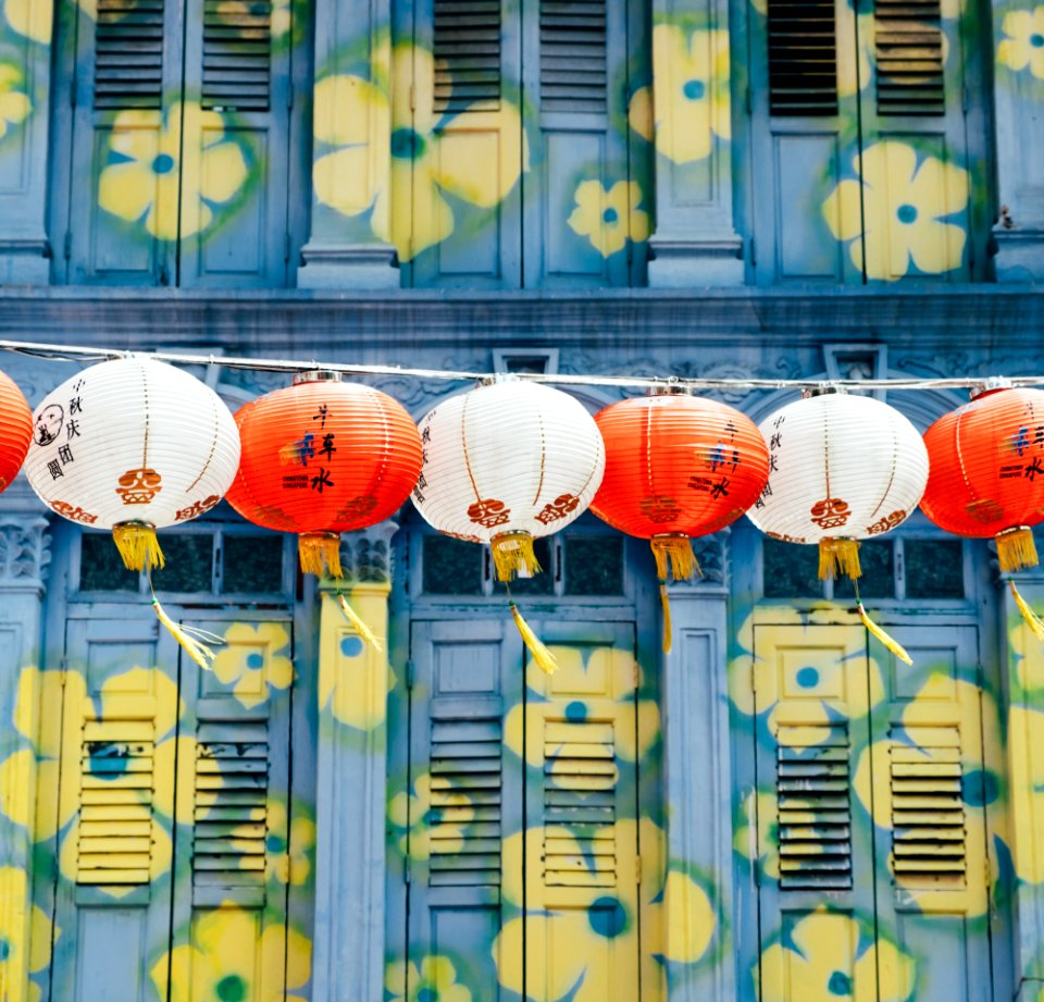 Chinese lantern hanging near windows