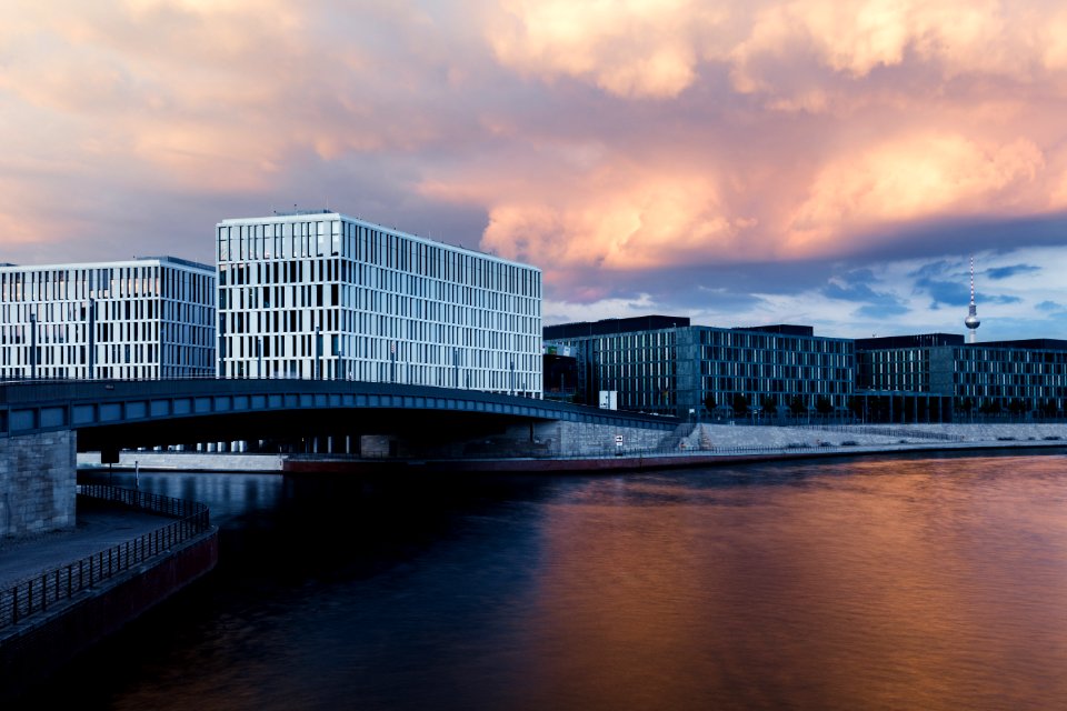 architectural photograph of structures near body of water photo