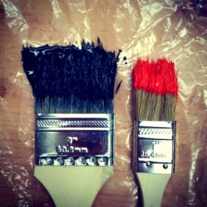 two paint brush on tables