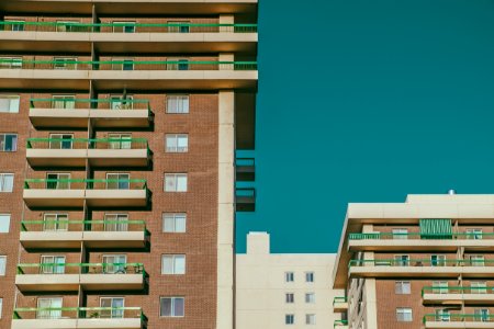 architectural photography of brown and beige concrete building photo