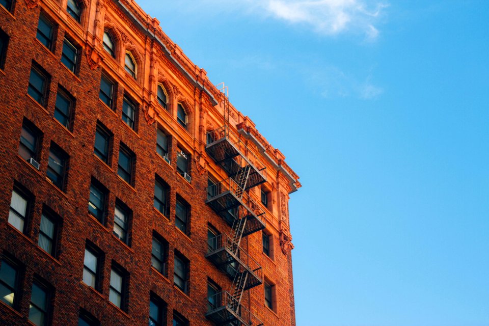 brown concrete brick building during daytime photo