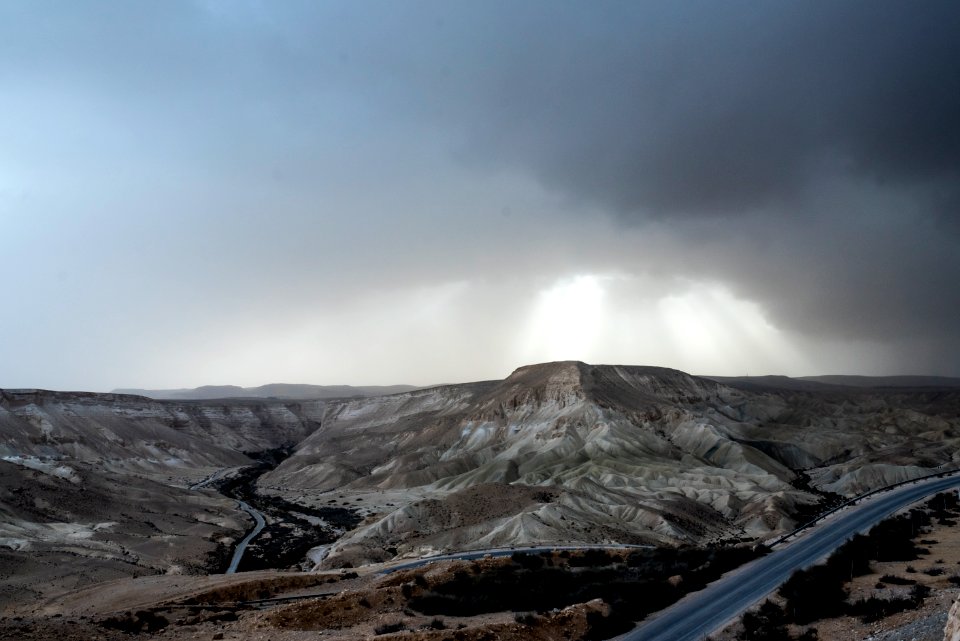 bird's-eye view photography of land with crepuscular rays