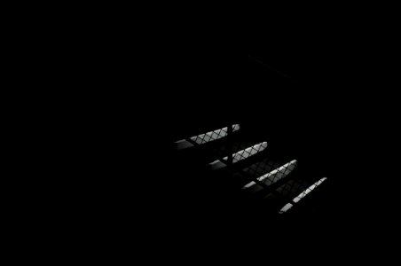 low light photography of black and white stair photo