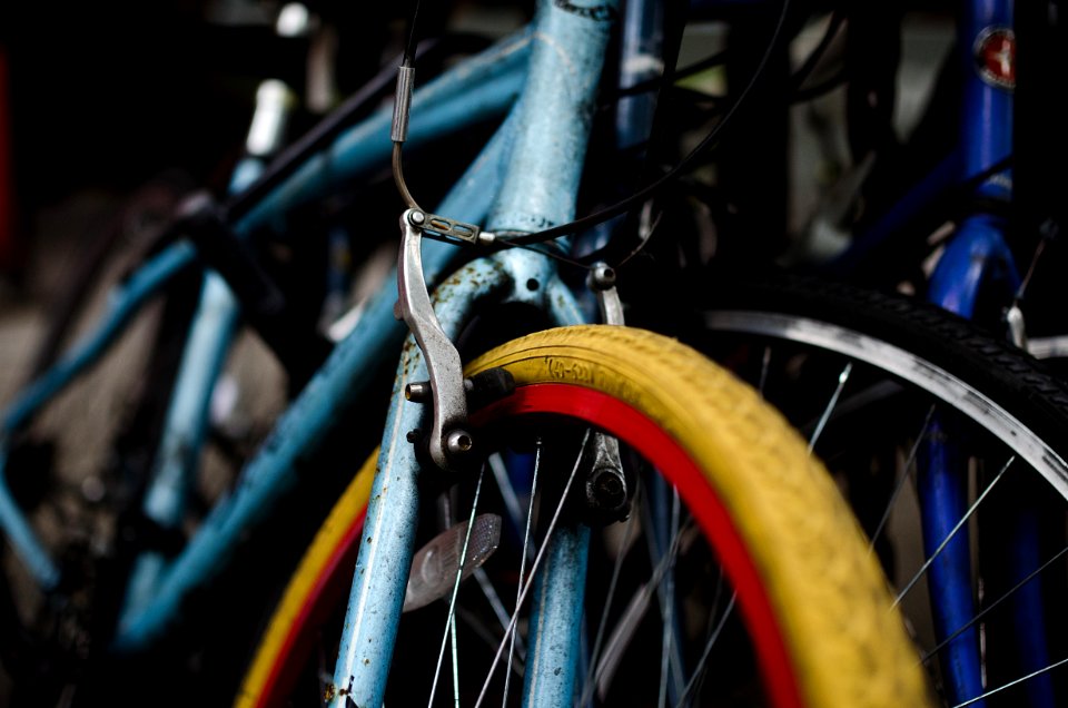 three blue bicycles