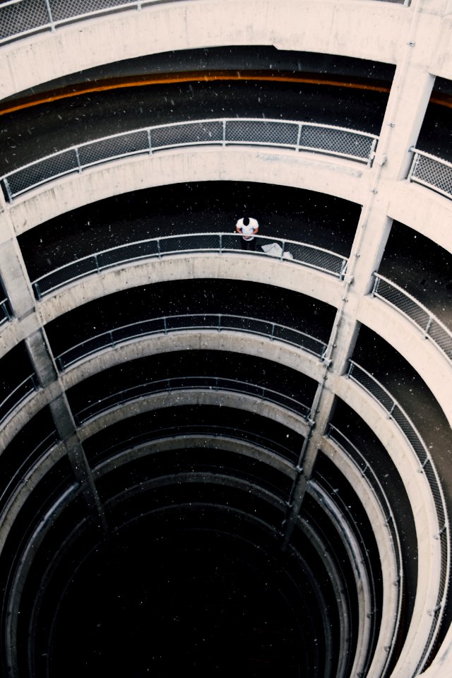 person standing near railing photo