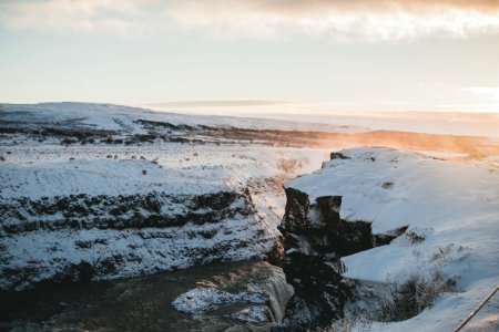 tundra mountain under cloudy sky photo