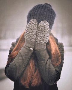 woman covering her face photo
